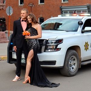 This is a Amarra Prom Dress! Black with slit and cut out and sequence!